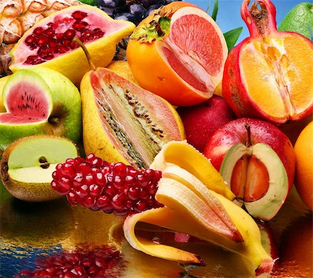 Concept photo of the modified fruits on a mirror Foto de stock - Royalty-Free Super Valor e Assinatura, Número: 400-04652792