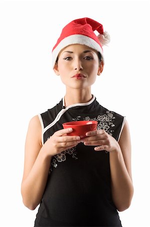 simsearch:400-06477682,k - asian santa claus girl holding traditional red chinese cup for rice Stock Photo - Budget Royalty-Free & Subscription, Code: 400-04652937