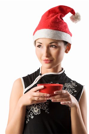 simsearch:400-06477682,k - asian santa claus girl holding traditional red chinese cup for rice Stock Photo - Budget Royalty-Free & Subscription, Code: 400-04652938