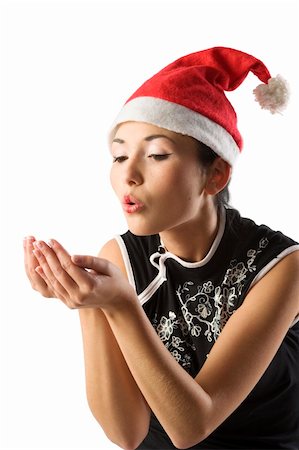 simsearch:400-06477682,k - very cute asian girl with red santa claus hat and black shirt Stock Photo - Budget Royalty-Free & Subscription, Code: 400-04652941