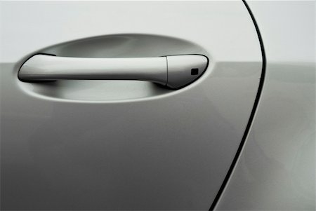 simsearch:400-03972245,k - Detail shot of the door handle of a silver luxury car Photographie de stock - Aubaine LD & Abonnement, Code: 400-04652954