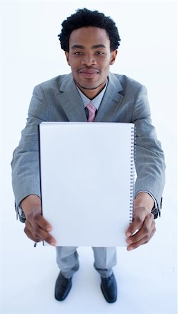 Afro-American businessman holding a big notebook Stock Photo - Budget Royalty-Free & Subscription, Code: 400-04653000