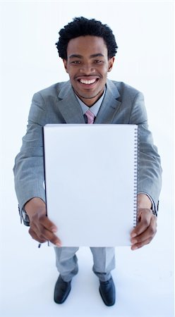 High angle of Afro-American businessman holding a big notebook Stock Photo - Budget Royalty-Free & Subscription, Code: 400-04653001