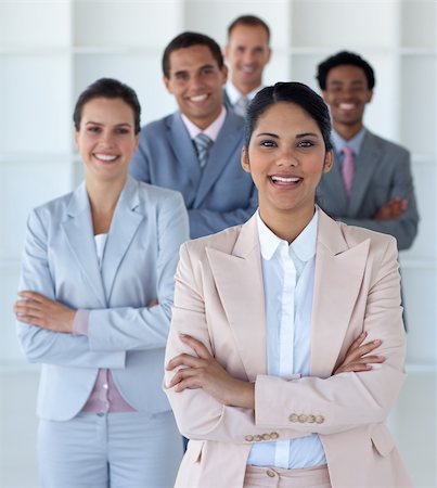 simsearch:400-05155599,k - Smiling businesswoman leading her team in office Stock Photo - Budget Royalty-Free & Subscription, Code: 400-04653045