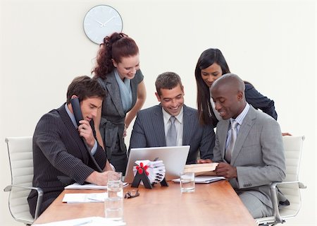 simsearch:400-04187718,k - Multi-ethnic group of people working in a business meeting Foto de stock - Royalty-Free Super Valor e Assinatura, Número: 400-04653203