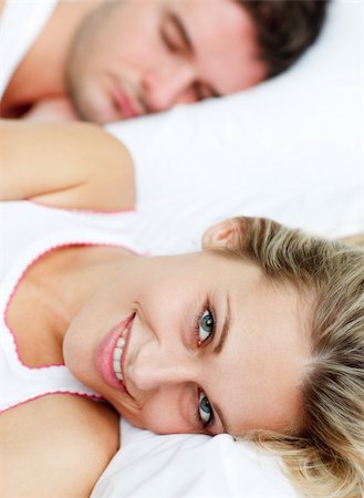Young lovers together sitting on bed Stock Photo - Budget Royalty-Free & Subscription, Code: 400-04653328