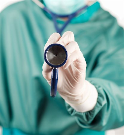 Close-up of a stethoscope in a operation hold by a surgeon Stock Photo - Budget Royalty-Free & Subscription, Code: 400-04653512