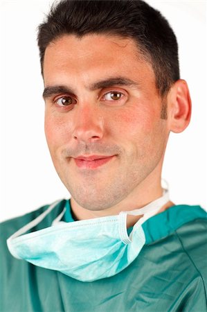 simsearch:400-05192323,k - Young surgeon smiling after an operation Stock Photo - Budget Royalty-Free & Subscription, Code: 400-04653513