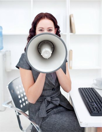 simsearch:400-09223567,k - Businesswoman shouting through a megaphone in office Stock Photo - Budget Royalty-Free & Subscription, Code: 400-04653522