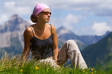 Young woman sitting on a high hill. Mountain region in Austria. Alps Stock Photo - Budget Royalty-Free & Subscription, Code: 400-04653968