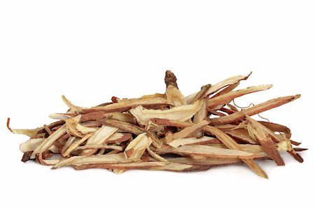 Liquorice root, used in chinese herbal medicine, isolated over white background. Gan cao, Radix glycyrrhiza. Stock Photo - Budget Royalty-Free & Subscription, Code: 400-04664215