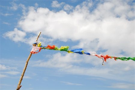 simsearch:696-03395477,k - Soaring flag against the blue sky. The flag is made of fabric slices. Photographie de stock - Aubaine LD & Abonnement, Code: 400-04664218