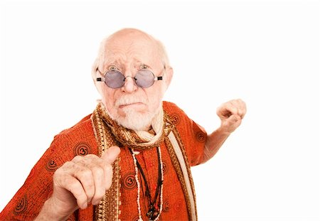 simsearch:693-07455847,k - Senior Man in Glasses on White Background Throwing a Punch Stockbilder - Microstock & Abonnement, Bildnummer: 400-04664437