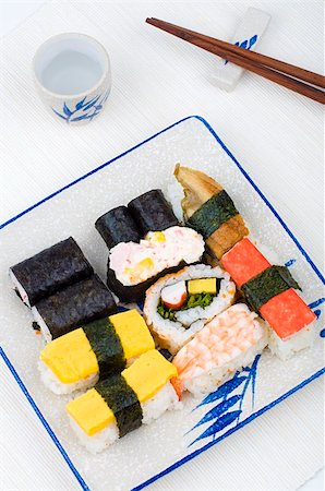 varieties of sushies with cup and chopstick Stock Photo - Budget Royalty-Free & Subscription, Code: 400-04664557
