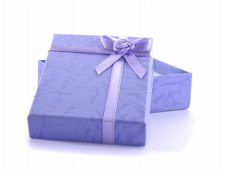 symbol present - isolated small present box in white Stock Photo - Budget Royalty-Free & Subscription, Code: 400-04664628