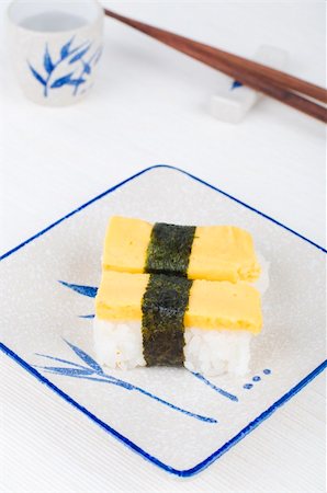 simsearch:400-04292843,k - sushi with chopstick and plate Stock Photo - Budget Royalty-Free & Subscription, Code: 400-04664632