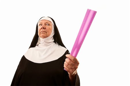 simsearch:400-04671065,k - Angry senior nun brandishing ruler as weapon Stock Photo - Budget Royalty-Free & Subscription, Code: 400-04664981