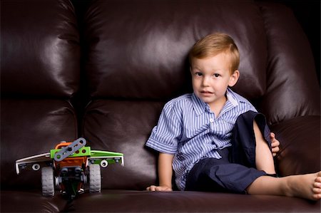 little boy with his favourite aeroplane toy Stock Photo - Budget Royalty-Free & Subscription, Code: 400-04665322