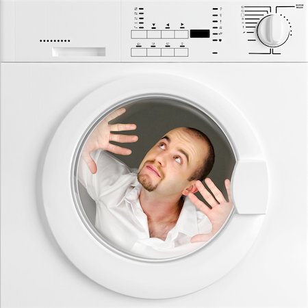 funny portrait of man inside washing machine, household life Photographie de stock - Aubaine LD & Abonnement, Code: 400-04665364