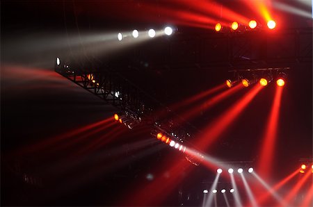 Red and white spot lights in a music concert Foto de stock - Super Valor sin royalties y Suscripción, Código: 400-04665526