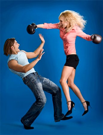 simsearch:400-04603456,k - woman wearing boxing gloves hitting man Foto de stock - Royalty-Free Super Valor e Assinatura, Número: 400-04665654