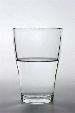 product shot of an half full water glass Stock Photo - Budget Royalty-Free & Subscription, Code: 400-04666019