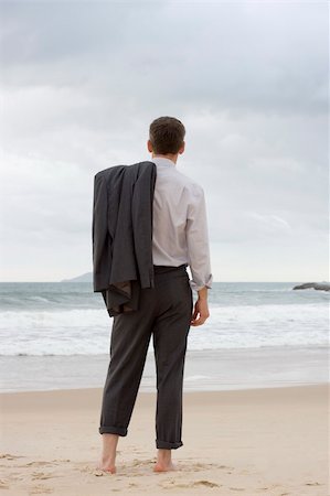 simsearch:400-04790531,k - Barefoot businessman relaxing on a beach Foto de stock - Royalty-Free Super Valor e Assinatura, Número: 400-04666209