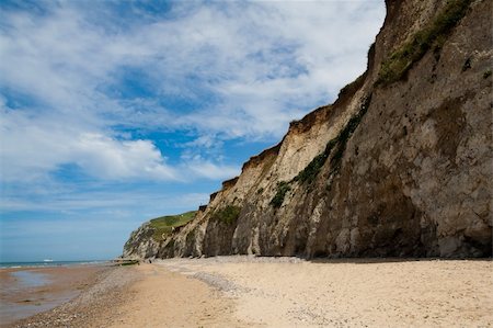 etretat - White cliffs on the sea shore. The coastline of France Foto de stock - Royalty-Free Super Valor e Assinatura, Número: 400-04666573