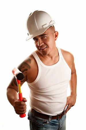 simsearch:400-04173797,k - Hispanic Man with Hammer and Hard Hat Stock Photo - Budget Royalty-Free & Subscription, Code: 400-04667335