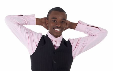 simsearch:400-04662774,k - Young Adult black african businessman wearing a dark smart-casual outfit without a Jacket, but with a pink shirt and a dark waistcoat on a white background in various poses with various facial expressions. Part of a series, Not Isolated. Foto de stock - Royalty-Free Super Valor e Assinatura, Número: 400-04667433