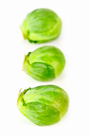 simsearch:400-03939080,k - Three green brussels sprouts isolated on white background Foto de stock - Super Valor sin royalties y Suscripción, Código: 400-04667846