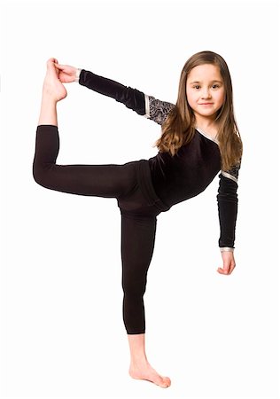 slim child - Young girl doing gymnastics isolated on white background Stock Photo - Budget Royalty-Free & Subscription, Code: 400-04668138