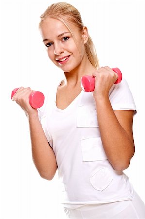 simsearch:400-06083451,k - pink dumbbells in the hands of women on a white background Photographie de stock - Aubaine LD & Abonnement, Code: 400-04668208