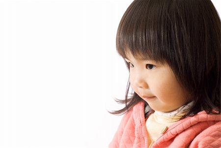 simsearch:400-06098679,k - Asian kid portrait with thinking express and cute face. Fotografie stock - Microstock e Abbonamento, Codice: 400-04668771