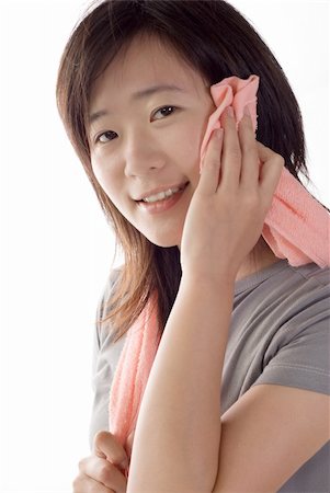 simsearch:400-04676820,k - Sport woman use towel after excise on white background. Photographie de stock - Aubaine LD & Abonnement, Code: 400-04669953