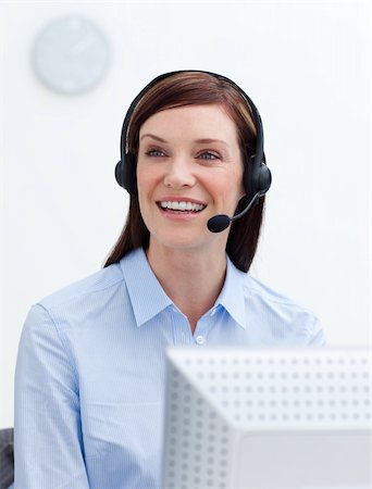 simsearch:400-03912315,k - Laughing businesswoman with headset on against white background Photographie de stock - Aubaine LD & Abonnement, Code: 400-04660310