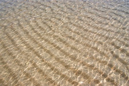 Rippled water on a sandy shore Stockbilder - Microstock & Abonnement, Bildnummer: 400-04661019