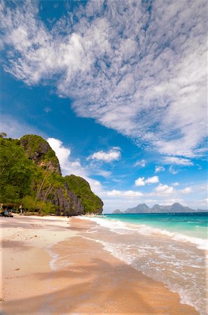 philippines sunsets - A gorgeous white sand beach El-Nido Beach. Palawan Islands, Phillipines Stock Photo - Budget Royalty-Free & Subscription, Code: 400-04661054