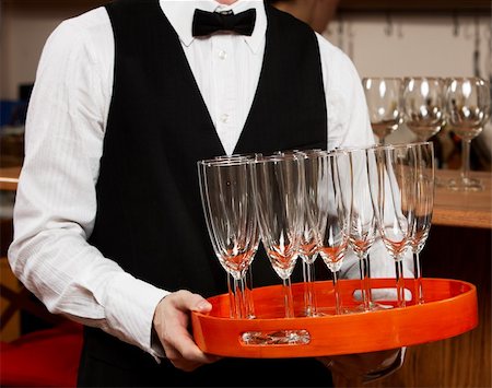 professional waiter in uniform is serving wine Photographie de stock - Aubaine LD & Abonnement, Code: 400-04661096