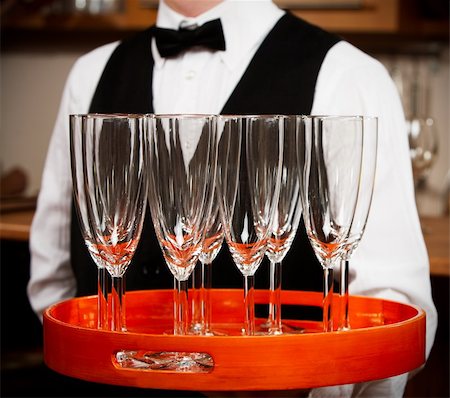 professional waiter in uniform is serving wine Stock Photo - Budget Royalty-Free & Subscription, Code: 400-04661097