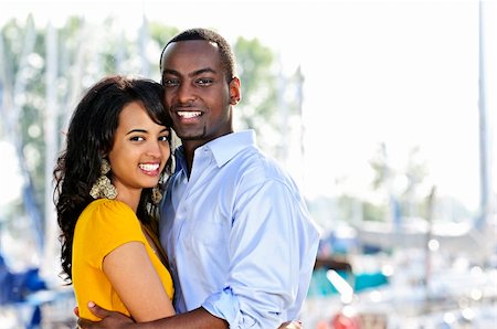 Young romantic couple hugging and standing at harbor Stock Photo - Budget Royalty-Free & Subscription, Code: 400-04661460