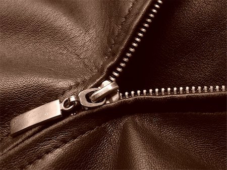 sepia toned leather jacket fragment with metal zipper Stock Photo - Budget Royalty-Free & Subscription, Code: 400-04662507