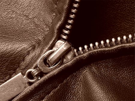 sepia toned leather jacket fragment with metal zipper closeup Stock Photo - Budget Royalty-Free & Subscription, Code: 400-04662508