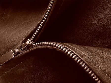 sepia toned leather jacket fragment with metal zipper Stock Photo - Budget Royalty-Free & Subscription, Code: 400-04662502