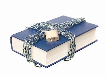 Book with a chain and lock wrapped around it Stock Photo - Budget Royalty-Free & Subscription, Code: 400-04662695