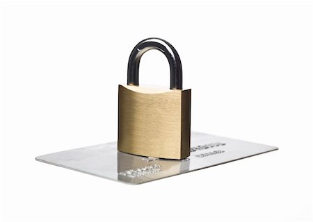 Credit card and a padlock isolated on a white background Stock Photo - Budget Royalty-Free & Subscription, Code: 400-04662704