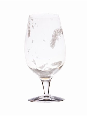 Empty glass of beer isolated on a white background Stock Photo - Budget Royalty-Free & Subscription, Code: 400-04662712