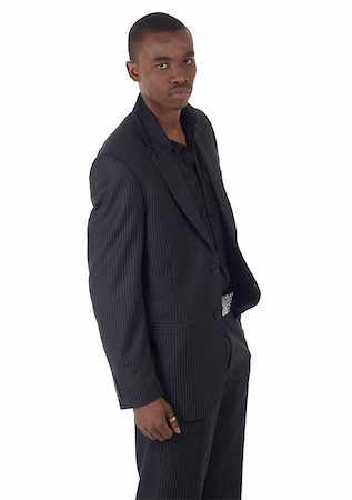 simsearch:400-04662774,k - Young Adult black african businessman wearing a dark smart-casual suit and Jacket on a white background in various poses with various facial expressions. Part of a series, Not Isolated. Foto de stock - Royalty-Free Super Valor e Assinatura, Número: 400-04662757
