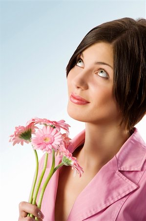 simsearch:400-04667271,k - nice shot of a cute young woman with pink jacket and pink flowers Stock Photo - Budget Royalty-Free & Subscription, Code: 400-04662760