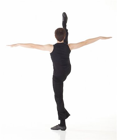 Young caucasian Modern Jazz dancer in a black top and black pants on a white background displaying various positions. NOT ISOLATED Stock Photo - Budget Royalty-Free & Subscription, Code: 400-04662850